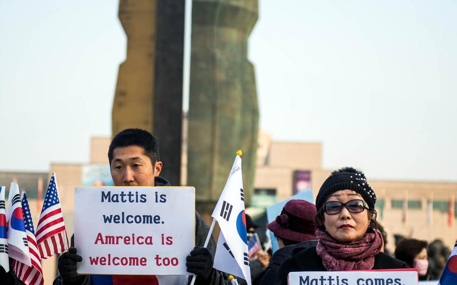 South Koreans welcome U.S. Defense Secretary Jim Mattis at the South Korean Ministry of National Defense in Seoul, South Korea, Friday, Feb. 3, 2017. 