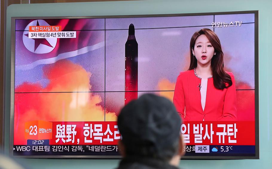 A man watches a TV news program reporting about North Korea's missile launch at the Seoul Train Station in Seoul, South Korea, Sunday, Feb. 12, 2017.. North Korea reportedly fired a ballistic missile early Sunday in what would be its first such test of the year and an implicit challenge to President Donald Trump's new administration. Details of the launch, including the type of missile, were scant. The letters read "The ruling and the opposition parties denounce North Korea's missile launch."