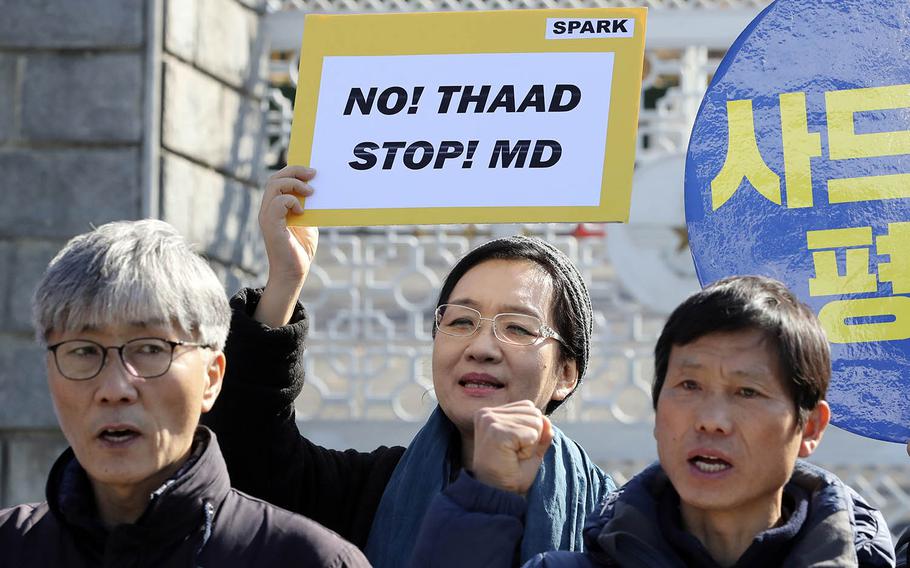 Protesters shout slogans during a rally to oppose the plan to deploy the Terminal High-Altitude Area Defense system, or THAAD, in front of the Defense Ministry in Seoul, South Korea, on March 7, 2017.