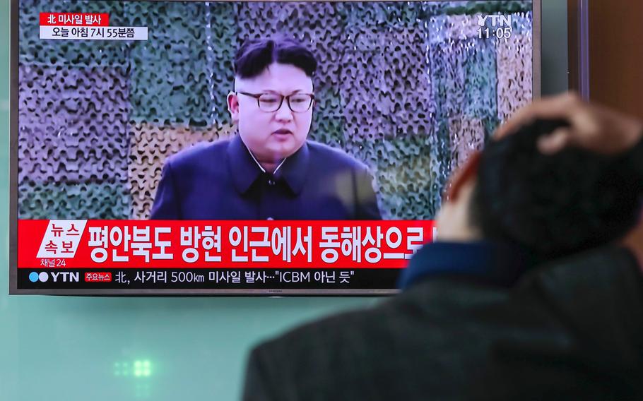 A man in Seoul, South Korea, watches a TV screen showing an image of North Korean leader Kim Jong Un during a news broadcast on Feb. 12, 2017.