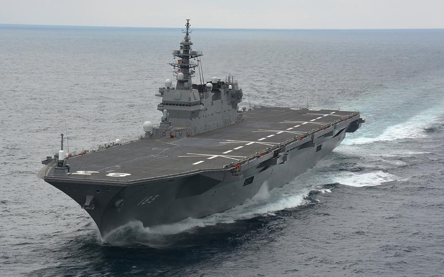 China responded cautiously to reports that the helicopter destroyer JS Izumo, shown here in an undated photo, may transit the South China Sea in May.
