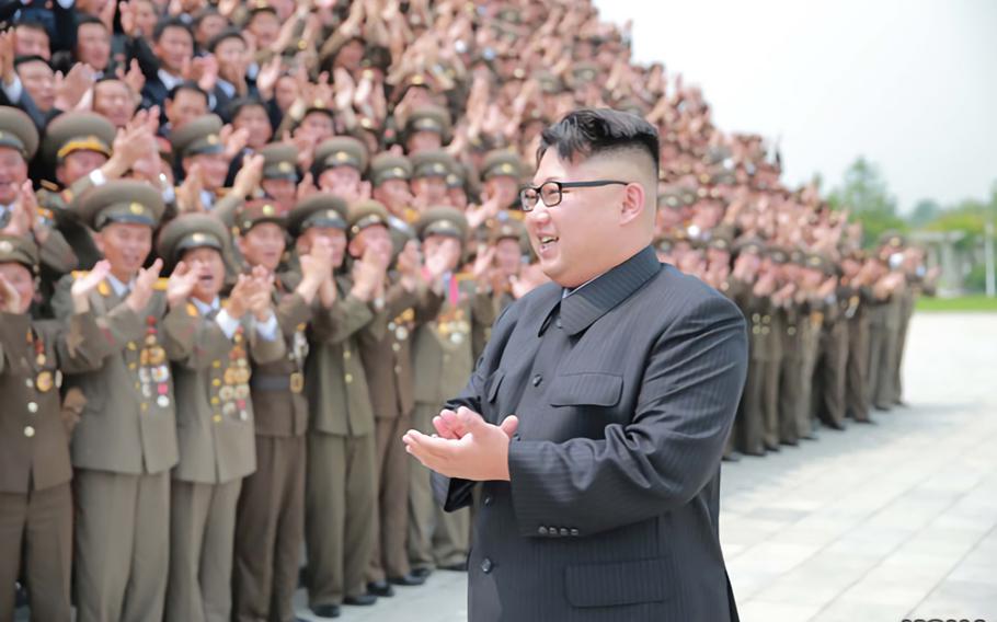 North Korean leader Kim Jong Un congratulates hundreds of North Korean generals, scientists, technicians and others who contributed to a “successful” missile test in June 2016.