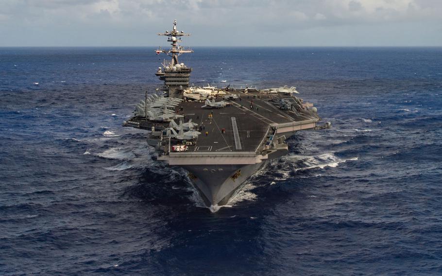 The aircraft carrier USS Carl Vinson (CVN 70) transits the Pacific Ocean. The Carl Vinson Carrier Strike Group is on a regularly scheduled Western Pacific deployment.