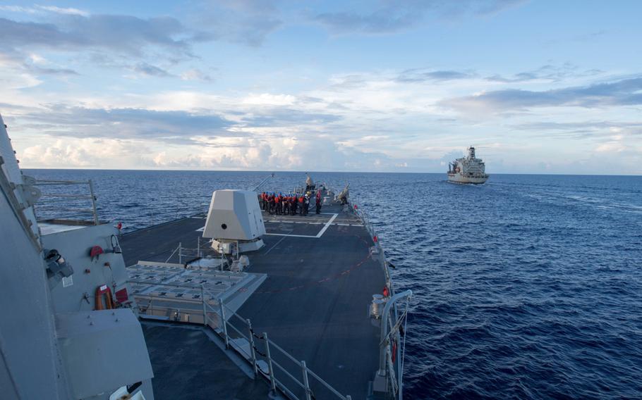 The destroyer USS Dewey shown here during a supply replenishment on May 19 in the South China Sea, sailed within 12 nautical miles of Mischief Reef, a China-occupied territory, as part of the first freedom-of-navigation operation undertaken under the Trump administration.