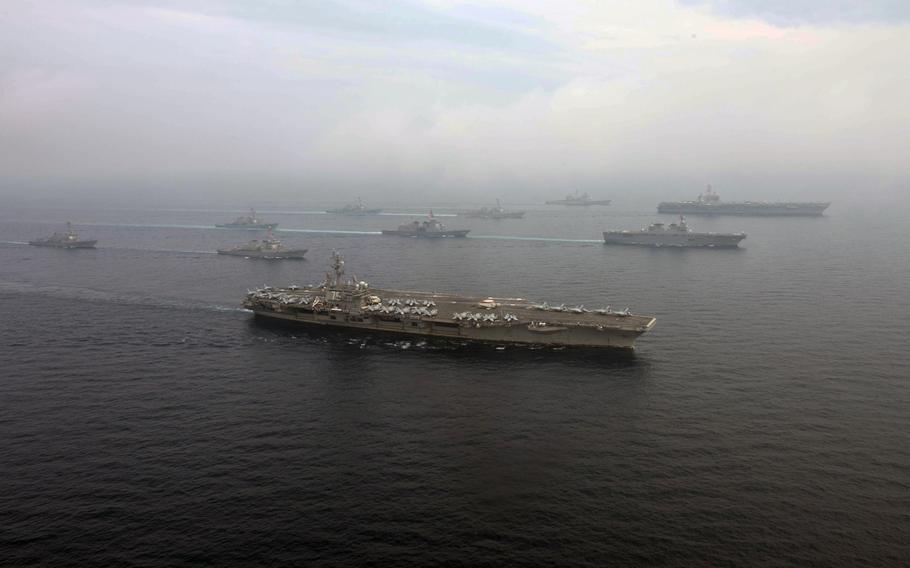 The USS Carl Vinson strike group and the USS Ronald Reagan strike group patrol the Sea of Japan alongside the Japanese ships JS Hyuga and JS Ashigara on June 1, 2017.  