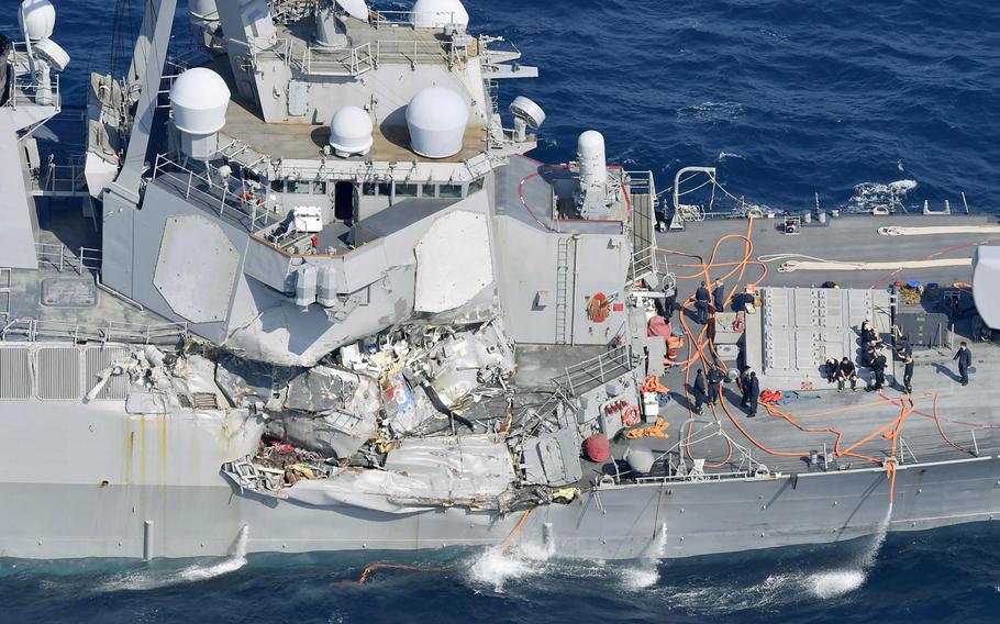 The damage of the right side of the USS Fitzgerald is seen off Shimoda, Shizuoka prefecture, Japan, after the Navy destroyer collided with a merchant ship, Saturday, June 17, 2017. The U.S. Navy says the USS Fitzgerald suffered damage below the water line on its starboard side after it collided with a Philippine-flagged merchant ship.

