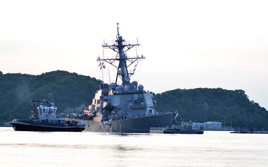 The destroyer USS Fitzgerald returns to Fleet Activities Yokosuka on June 17, 2017 following a collision with a merchant vessel 