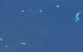 The South China Sea and parts of the Spratly Islands are seen in this 2014 image taken from the International Space Station. 