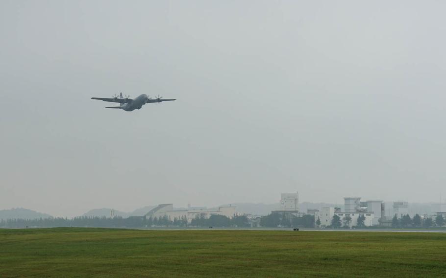 One of the 374th Airlift Wing's new C-130J Super Hercules takes off on the aircraft's first operational flight at Yokota Air Base, Japan, Friday, June 30, 2017.
