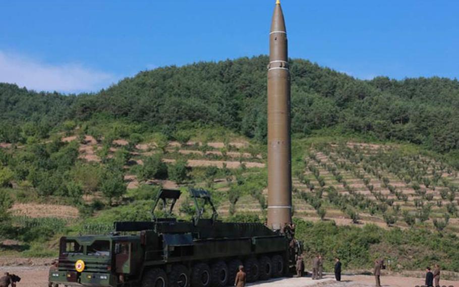 Photos published by the state-run Korean Central News Agency purportedly show what North Korea claims is an intercontinental ballistic missile. 