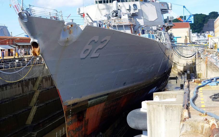 The USS Fitzgerald went into dry dock at Yokosuka Naval Base, Japan, Tuesday, July 11, 2017.