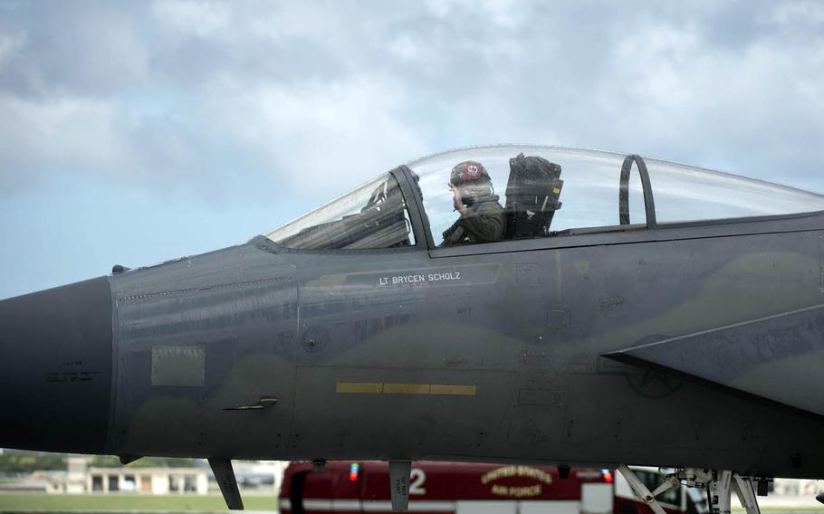 Brig. Gen. Barry Cornish, outgoing 18th Wing commander, waves from the cockpit of an F-15 Eagle at Kadena Air Base, Japan, June 29, 2017.