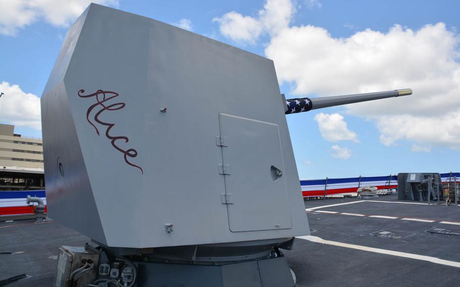 The Alice Gun, the 5-inch cannon on the bow of the USS John Finn, honors the wife of the destroyer's namesake, a Marine who survived the 1941 Pearl Harbor attack and was awarded the war's first Medal of Honor.