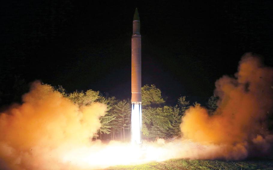 This Friday, July 28, 2017, photo distributed by the North Korean government on Saturday, July 29, 2017, shows what was said to be the launch of a Hwasong-14 intercontinental ballistic missile at an undisclosed location in North Korea. 