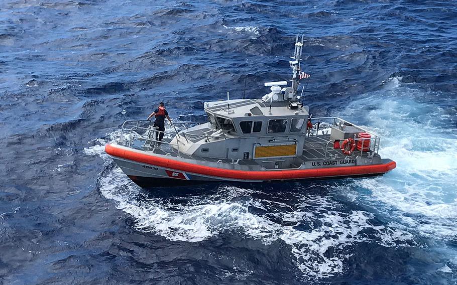 A crew out of Coast Guard Station Honolulu conducts a search on Wednesday, Aug. 16, 2017 for five soldiers who were aboard an Army UH-60 Black Hawk helicopter that went down about two miles west of Oahu. The helicopter crew was conducting night training on Tuesday. 