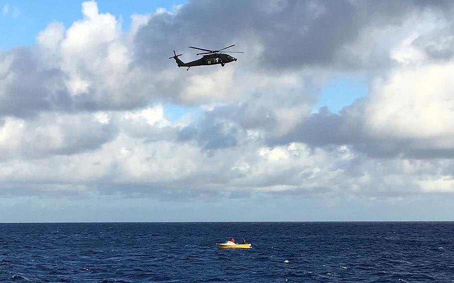 A UH-60 Black Hawk helicopter aircrew from Wheeler Army Airfield and a fireboat crew from the Honolulu Fire Department are shown conducting a search for five crewmembers aboard a downed Army UH-60 Black Hawk helicopter off Oahu on Wednesday, Aug. 16, 2017. 