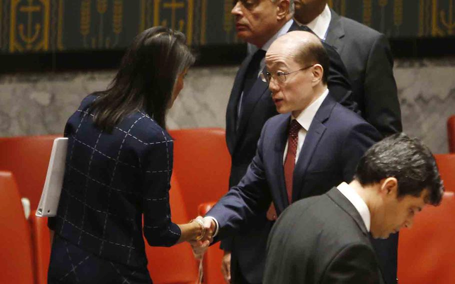 U.S. Ambassador to the United Nations Nikki Haley speaks to China's U.N. Ambassador Liu Jieyi after a vote to adopt a new sanctions resolution against North Korea during a meeting of the U.N. Security Council at U.N. headquarters, Monday, Sept. 11, 2017. 