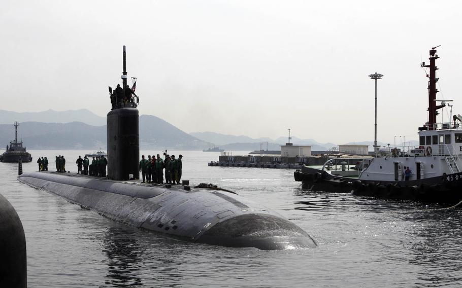 The Los Angeles-class attack submarine USS Tucson pulls into Chinhae, South Korea, during a port visit last year.