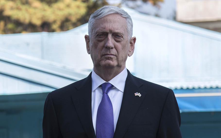 Secretary of Defense Jim Mattis stands in front of an armistice building inside the Joint Security Area at Panmunjom, South Korea, Friday, Oct. 27, 2017. 