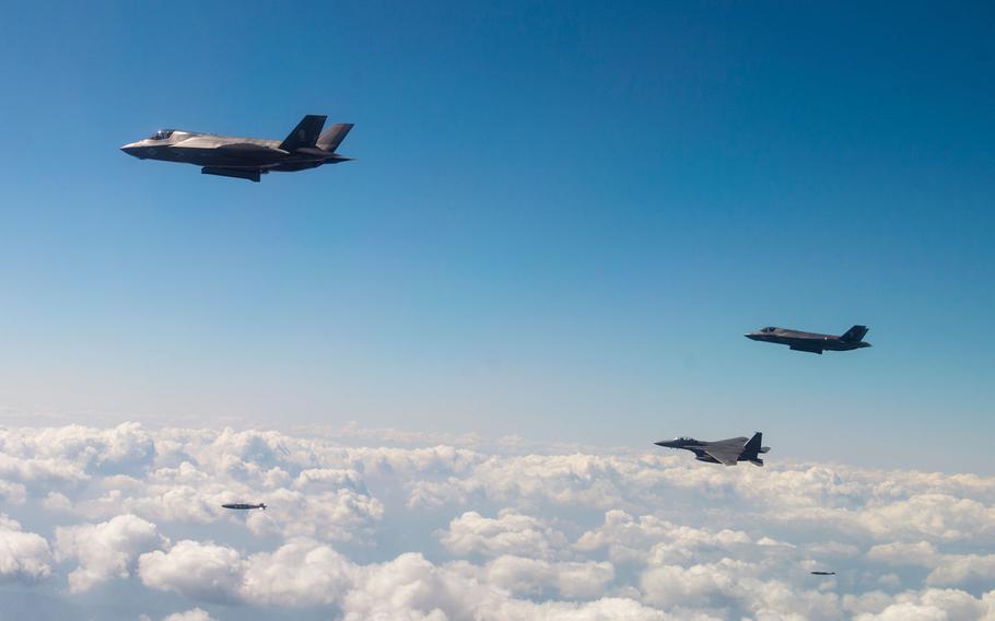Two U.S. Marine Corps F-35B Lightning II aircraft from Marine Corps Air Station Iwakuni, Japan, drop munitions at the Pilsung Range, South Korea on Aug. 31, 2017. 
