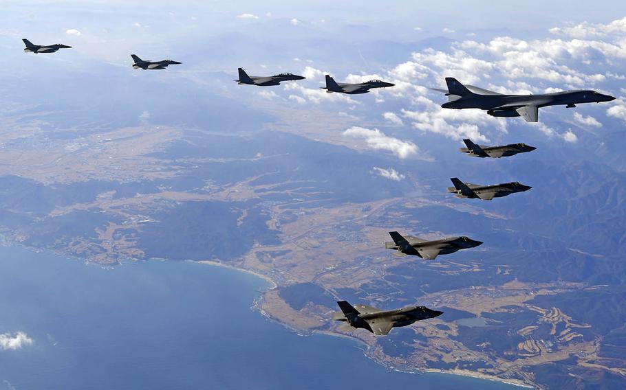 South Korean and American fighter jets fly over the Korean Peninsula with a U.S. B-1B Lancer bomber, Wednesday, Dec. 6, 2017.