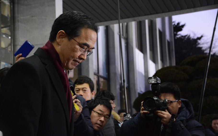 South Korean Unification Minister Cho Myoung-gyo prepares to leave Seoul for the Demilitarized Zone, where he will lead a five-member government delegation in rare talks with the North Koreans, Tuesday, Jan. 9, 2018.