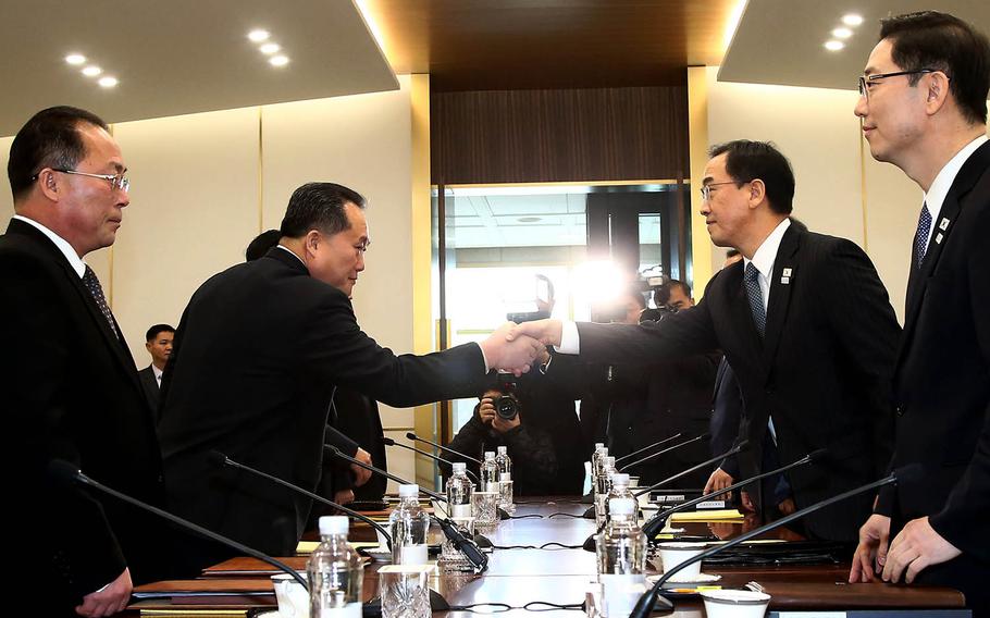 North Korea's chief delegate Ri Son Gwon, left, greets South Korean Unification Minister Cho Myoung-gyon during the first high-level talks between the two countries in more than two years, Tuesday, Jan. 9, 2017. The meeting took place in the truce village of Panmunjom in the heavily fortified border area.
