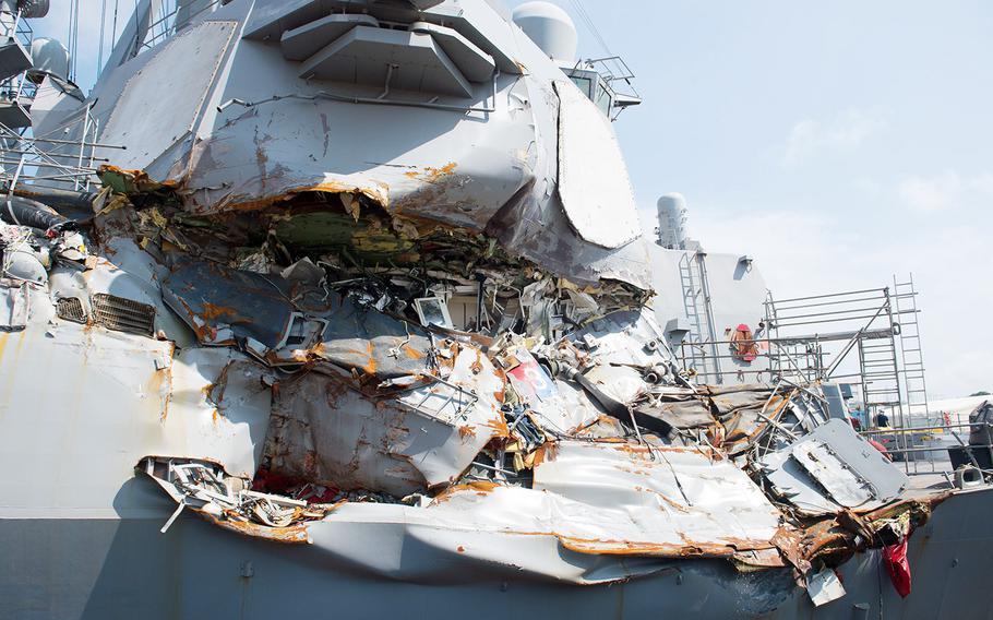 The collision-damaged USS Fitzgerald sits in dry dock last year at Yokosuka Naval Base, Japan.