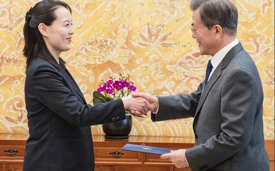 Kim Yo Jong, left, sister of North Korean leader Kim Jong Un, and South Korean President Moon Jae-in shake hands at the presidential house in Seoul, South Korea, Saturday, Feb. 10, 2018.