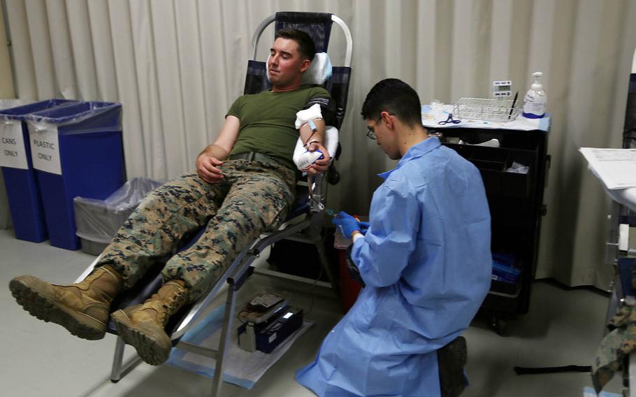 Lance Cpl. Jarrid Young donates blood at Camp Foster, Okinawa, Japan, Jan. 11, 2018, during a blood drive ahead of Cobra Gold drills in Thailand. 