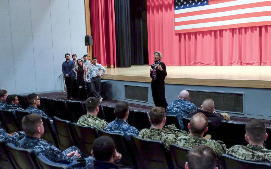 Jill Loftus, director of the Navy's Sexual Assault Prevention and Response Office, speaks to sailors after a Pure Praxis performance at Yokosuka Naval Base, Japan, Wednesday, Feb. 14, 2018.