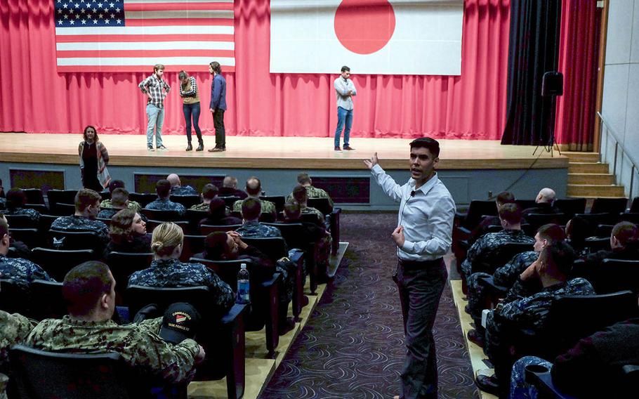 Pure Praxis actor Paul Rico leads sailors through a discussion about a sexual-assault roleplaying scenario at Yokosuka Naval Base, Japan, Wednesday, Feb. 14, 2018.