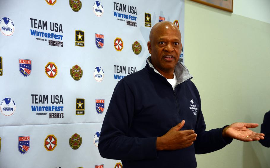 Two-time U.S. Olympian Willie Banks speaks to reporters during the Winterfest at Yongsan Garrison in Seoul, South Korea, Monday, Feb. 19, 2018
