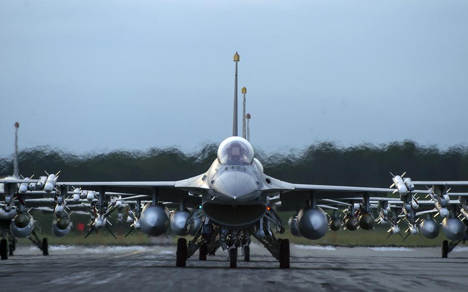 F-16 Fighting Falcons line the runway during an elephant walk at Misawa Air Base, Japan, Sept. 16, 2017.