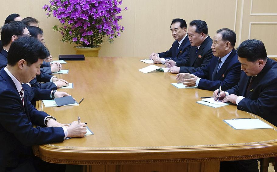 Kim Yong Chol, vice chairman of North Korea's ruling Workers' Party Central Committee, second from right, talks with South Korean delegation in Pyongyang, North Korea, Monday, March 5, 2018.