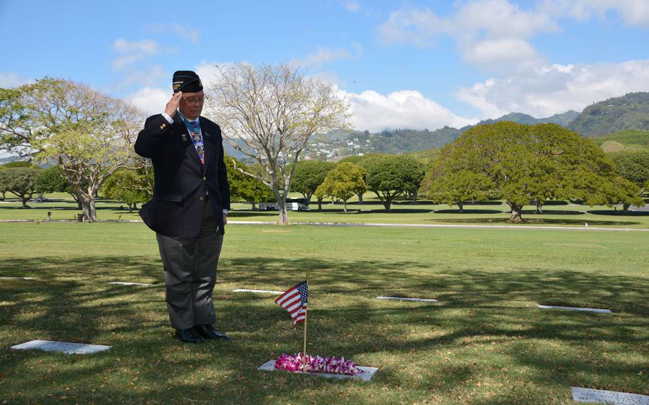 Hershel “Woody” Williams salutes before the grave of Charles G. Fischer on March 17, 2018. Fischer was a Marine Corps rifleman who died in Iwo Jima while providing covering fire for Williams. Williams learned of Fischer’s identity and gravesite location only several months ago.