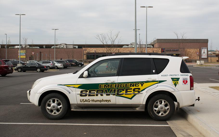 An Emergency Services Vehicle sits outside the Post Exchange at Camp Humphreys, South Korea, after the "all clear" was given during a potential active shooter event, Friday, April 13, 2018.