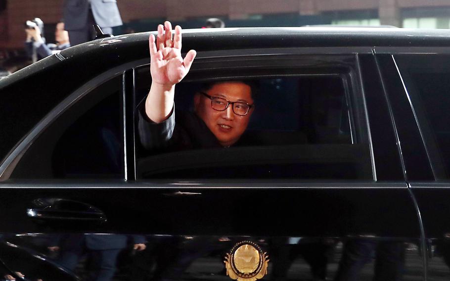 North Korean leader Kim Jong Un waves from a vehicle during the Inter-Korean Summit on Friday, April 27, 2018.