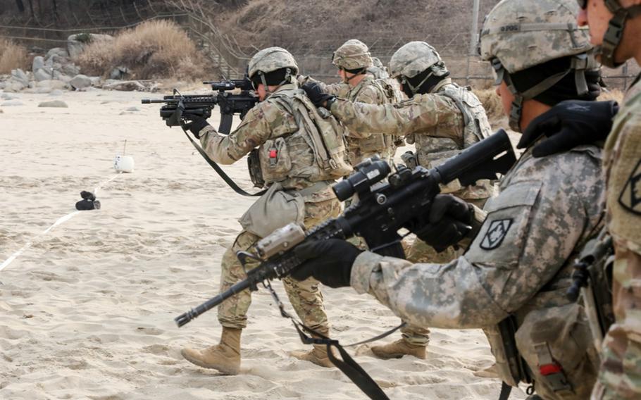 Soldiers assigned to the 2nd Battalion, 4th Field Artillery, 75th Fires Brigade train in South Korea on January 16, 2018.