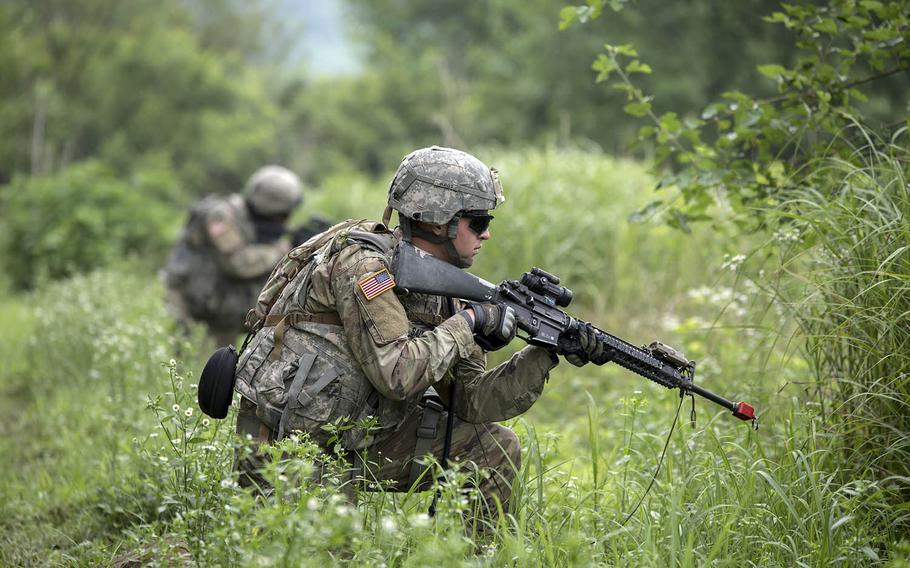 Soldiers from Bravo Company, 8th Brigade Engineer Battalion conduct a tactical road march during demolition training during the summer of 2017 in South Korea.