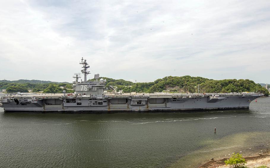 The aircraft carrier USS Ronald Reagan departs Yokosuka Naval Base, Japan, Friday, May 11, 2018. 