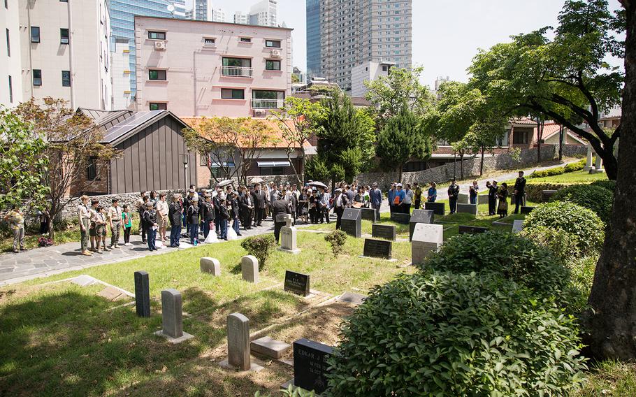 Americans and South Koreans pay respects to fallen U.S. servicemembers at Yanghwajin Cemetery in Seoul, South Korea, Monday, May 28, 2018. 