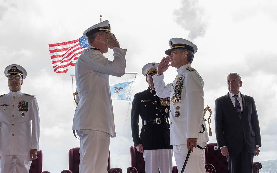 Adm. Phil Davidson, left, relieves Adm. Harry Harris, right, as commander of U.S. Pacific Command at Joint Base Pearl Harbor-Hickam on May 30, 2018.