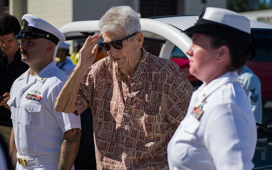 Retired Chief Boatswain's Mate and Pearl Harbor survivor Ray Emory salutes the Arleigh Burke-class guided-missile destroyer USS O'Kane on June 19, 2018. He was honored with a farewell ceremony at Pearl Harbor before he departs Hawaii to be with family.