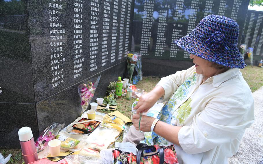 Haruko Arakaki, 74, attends the annual Irei no Hi ceremony at Okinawa Peace Memorial Park every year to "speak" to her father, who was lost during the Battle of Okinawa. The ceremony, held Saturday, June 23, 2018, marked the 73rd anniversary of the battle.
