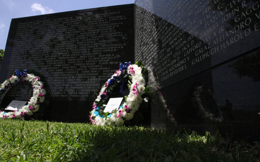 Wreaths are laid in the American section of Okinawa Peace Memorial Park’s Cornerstone of Peace memorial before the annual Irei no Hi ceremony on Saturday, June 23, 2018, commemorating the 73rd anniversary of the Battle of Okinawa