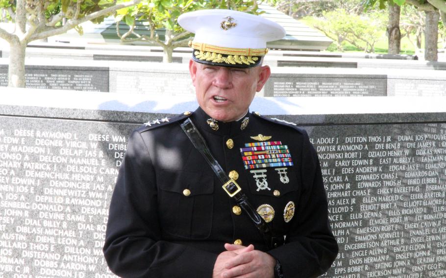 Lt. Gen. Lawrence Nicholson, III Marine Expeditionary Force commander, speaks to Marines and sailors Saturday in the American section of Okinawa Peace Memorial Park’s Cornerstone of Peace memorial at a ceremony commemorating the 73rd anniversary of the Battle of Okinawa.