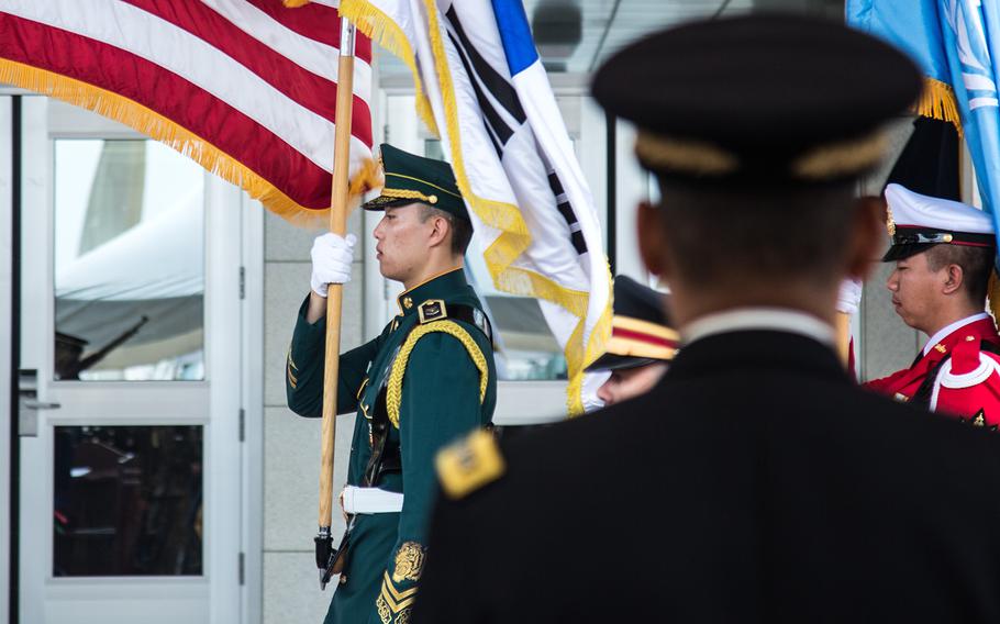 The honor guard marches in the colors at the new U.S. Forces Korea headquarters on Camp Humphreys, South Korea, June, 29, 2018.