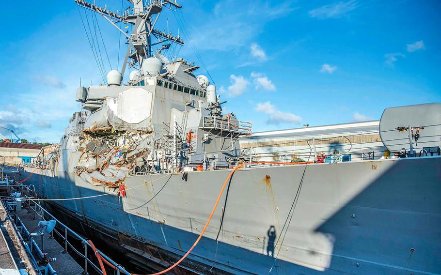 The collision-damaged guided-missile destroyer USS Fitzgerald sits in dry dock at Yokosuka Naval Base, Japan, July 11, 2017.
