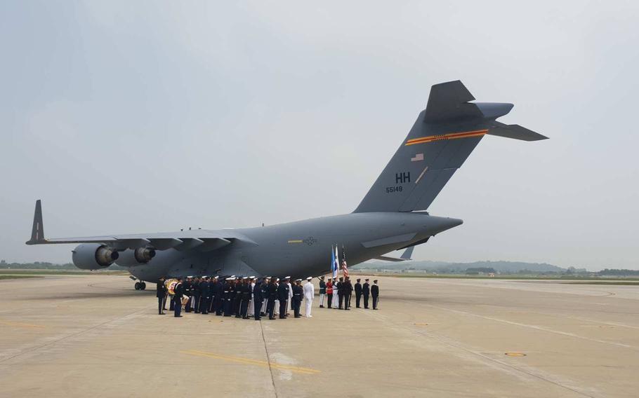 A C-17 carrying 55 cases of remains thought to be U.S. servicemembers killed in the Korean War returns to Osan Air Base, South Korea, Friday, July 27, 2018.